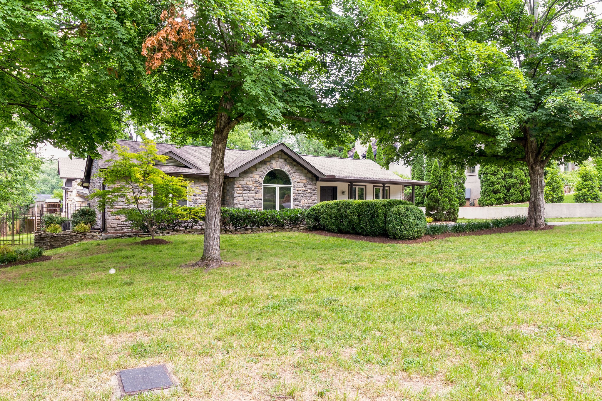4036 Sneed Road Nashville, TN 37215 - Photo 9 of 24 a front view of a house with a yard