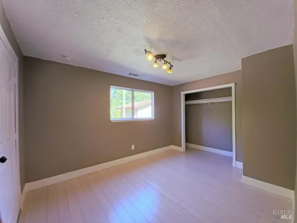 a view of porch with wooden floor