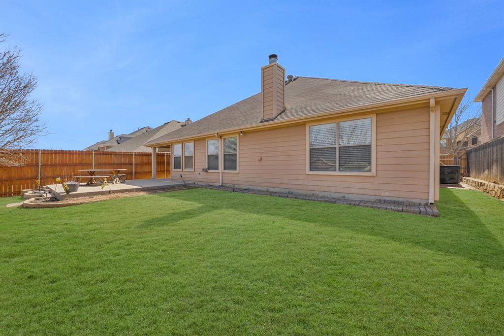 5129 Leeray Road Fort Worth, TX 76244 - Photo 17 of 39 a view of a house with a backyard