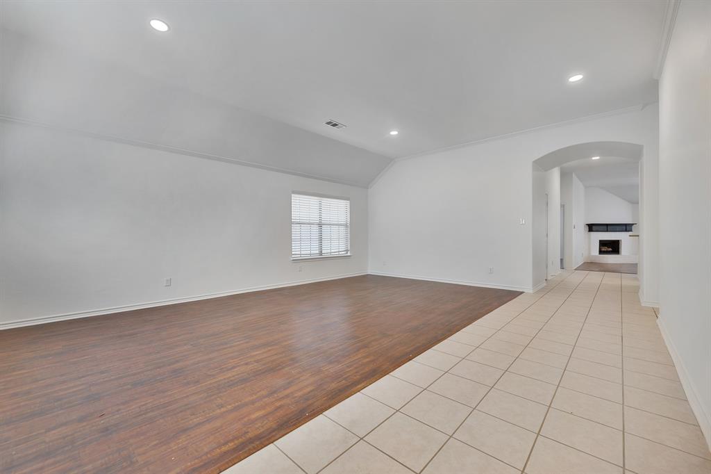 5129 Leeray Road Fort Worth, TX 76244 - Photo 19 of 39 an empty room with windows