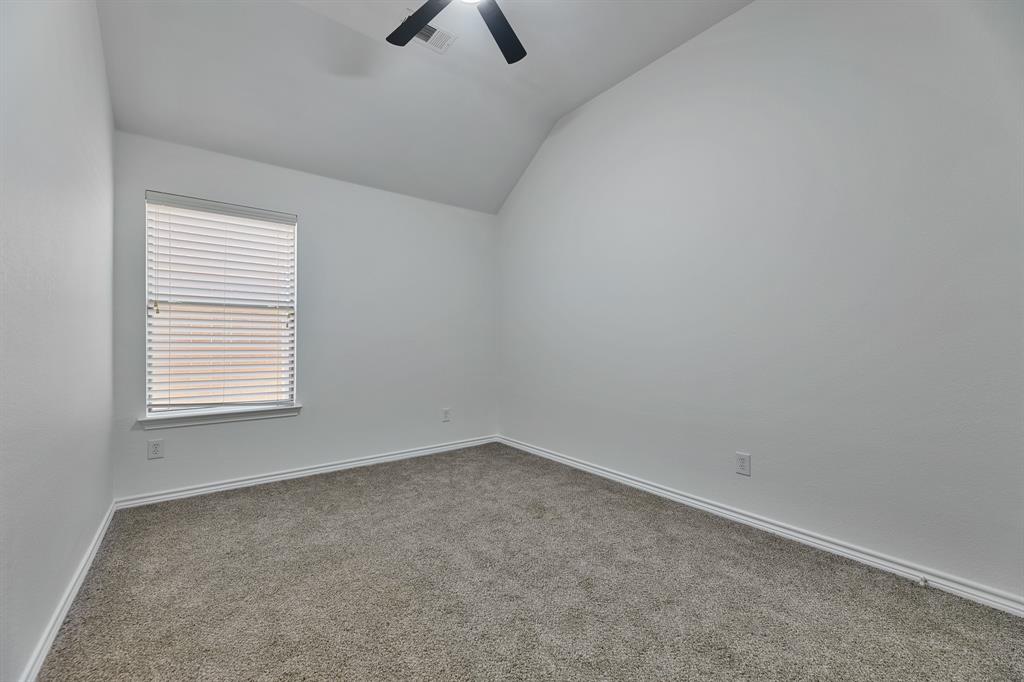 5129 Leeray Road Fort Worth, TX 76244 - Photo 24 of 39 an empty room with a window