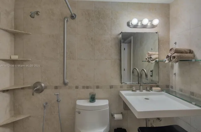 a bathroom with a sink double vanity and a mirror