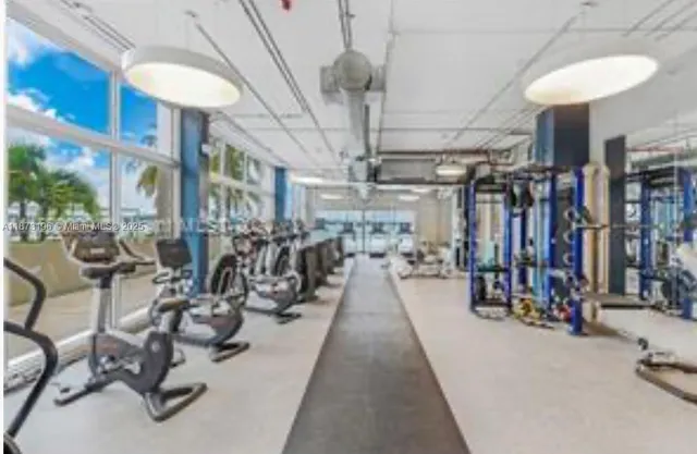a view of a room with gym equipment