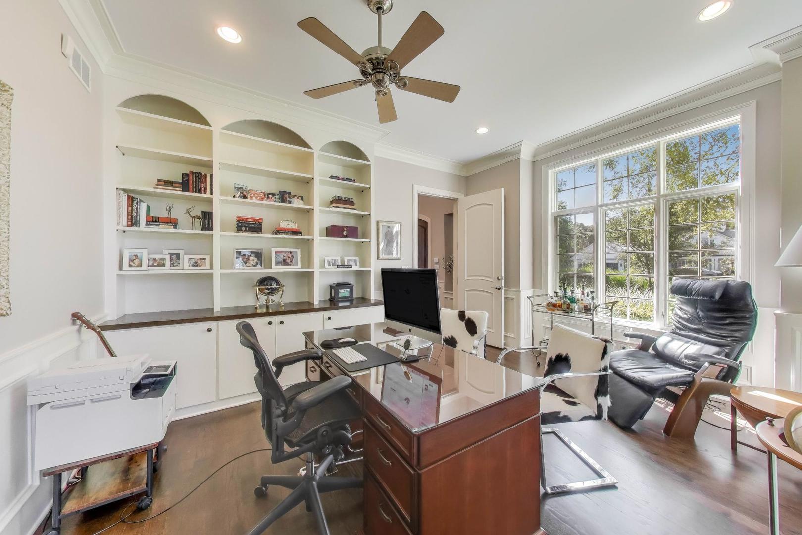 19 Meadowview Road Northfield, IL 60093 - Photo 14 of 65 a view of a workspace with furniture and a window