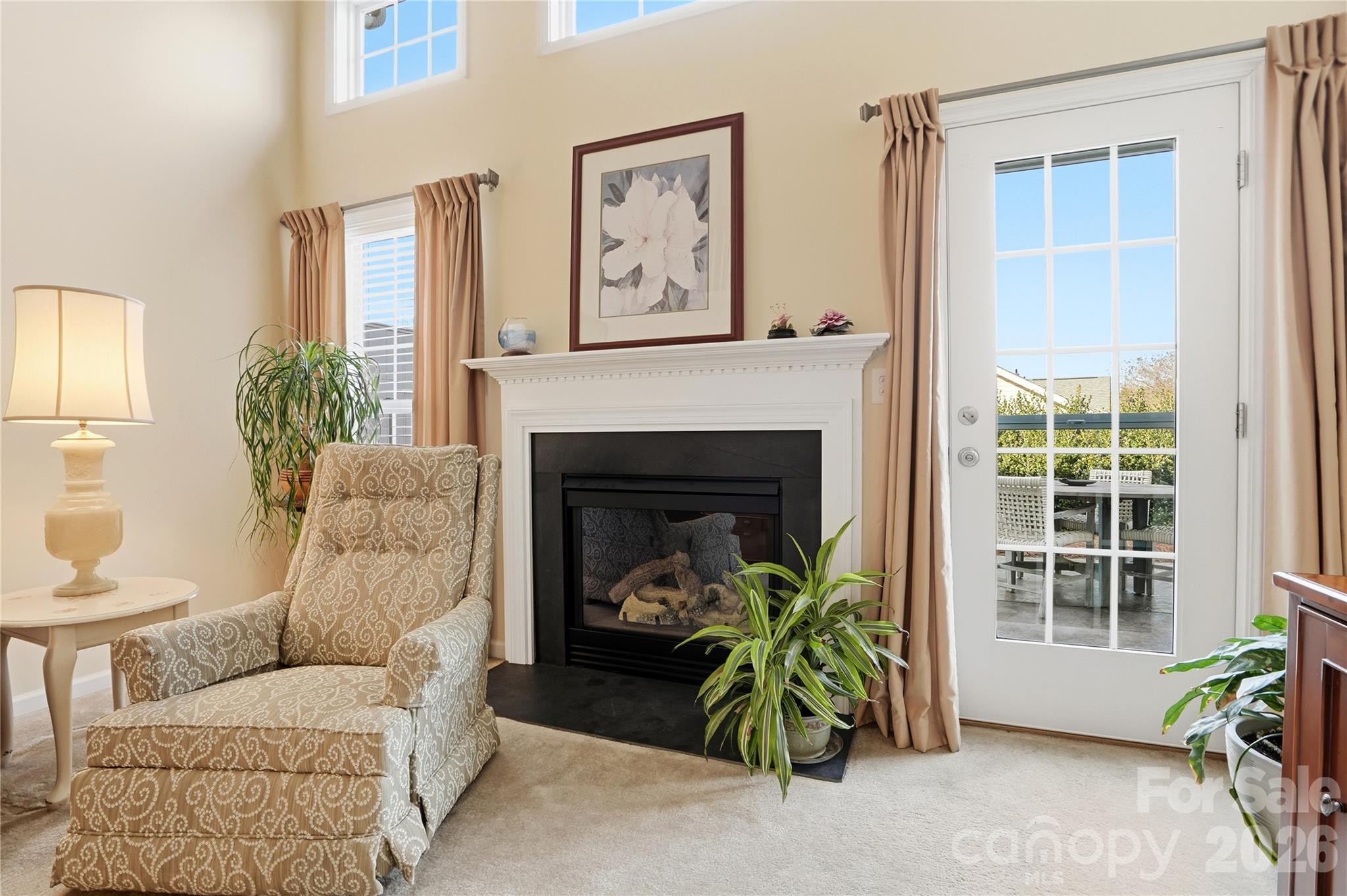 335 Garnet Court Fort Mill, SC 29708 - Photo 17 of 44 a living room with furniture and a fireplace