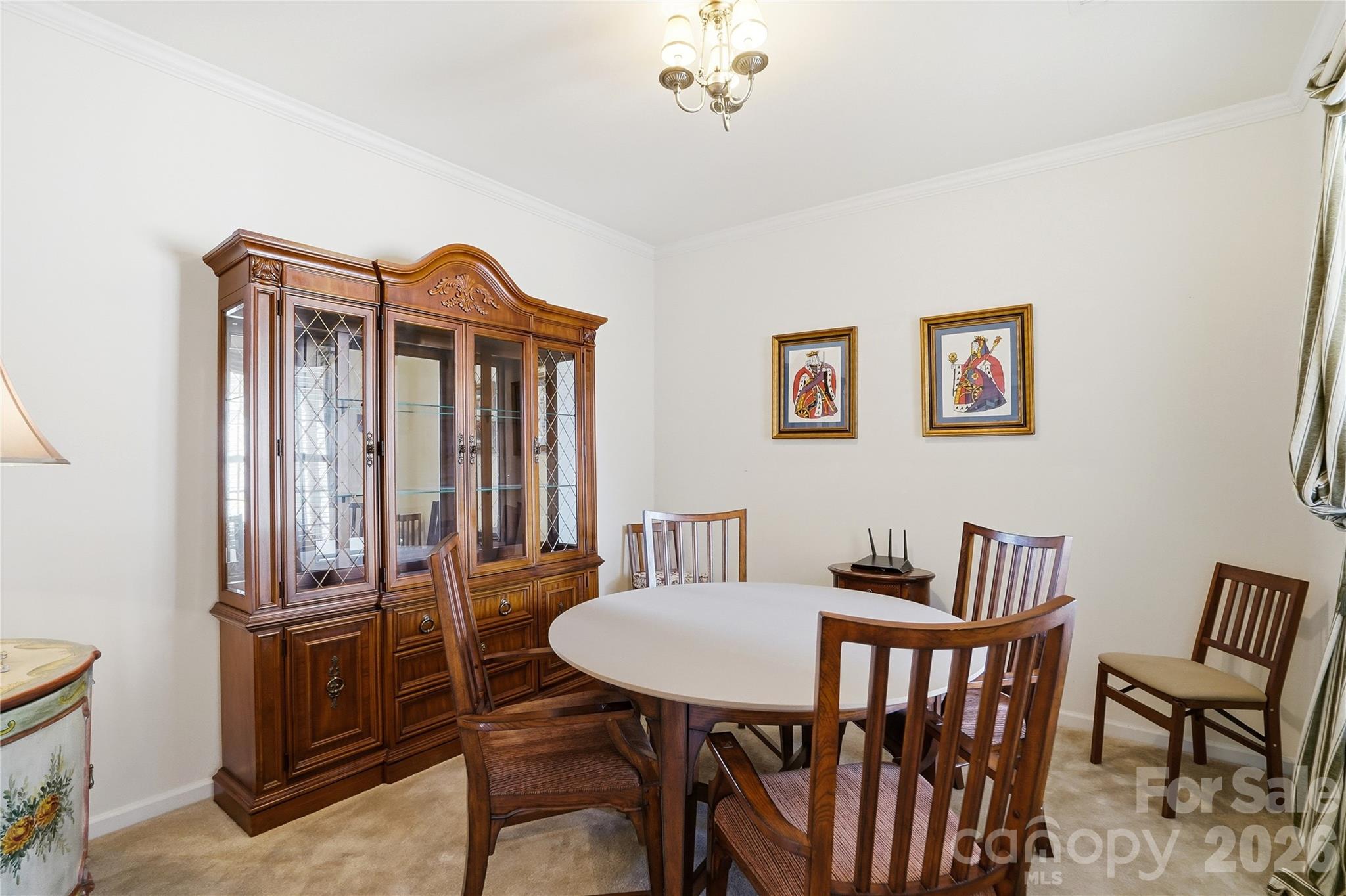 335 Garnet Court Fort Mill, SC 29708 - Photo 24 of 44 a view of a dining room with furniture
