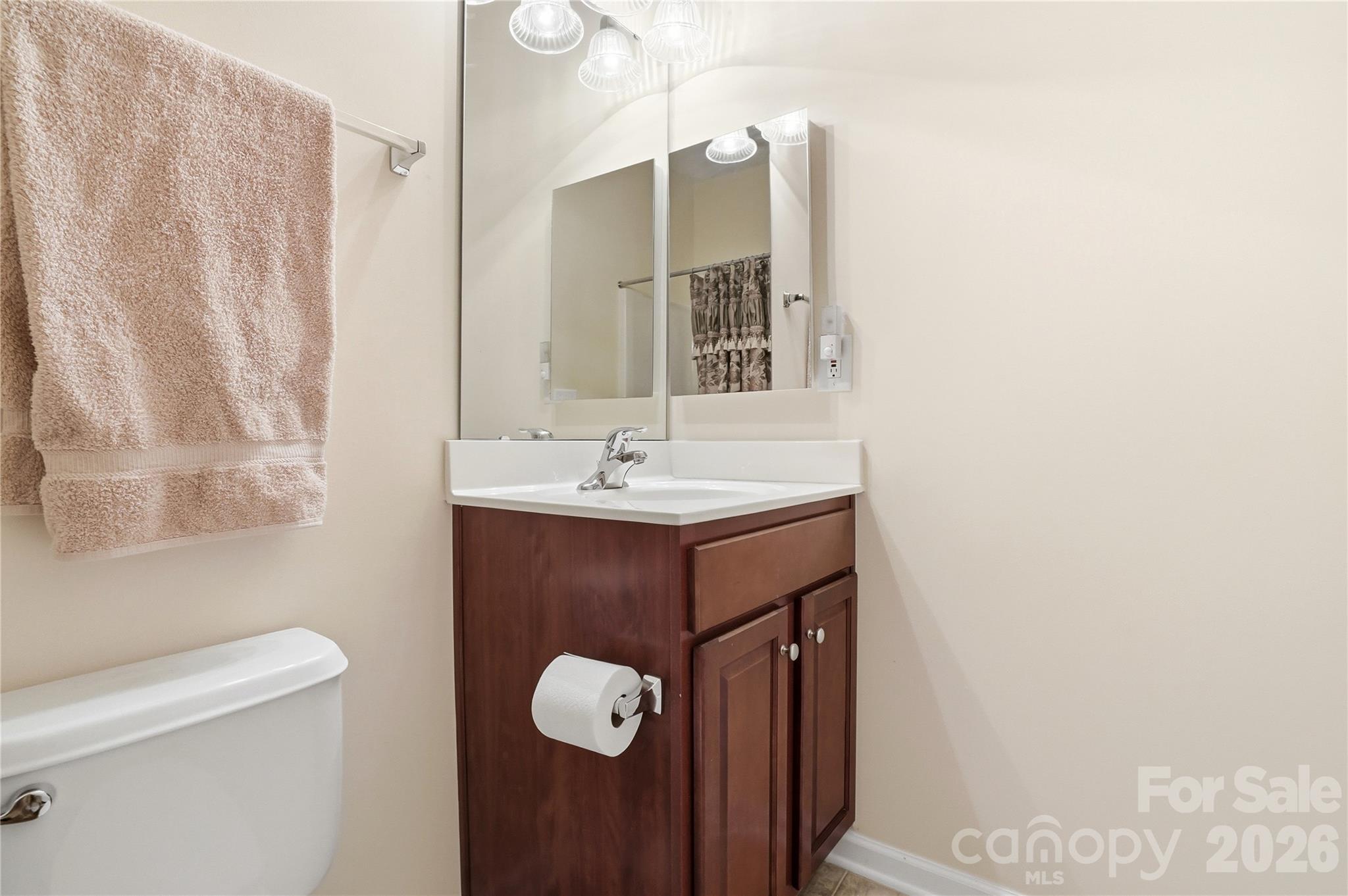 335 Garnet Court Fort Mill, SC 29708 - Photo 26 of 44 a bathroom with a sink and a toilet