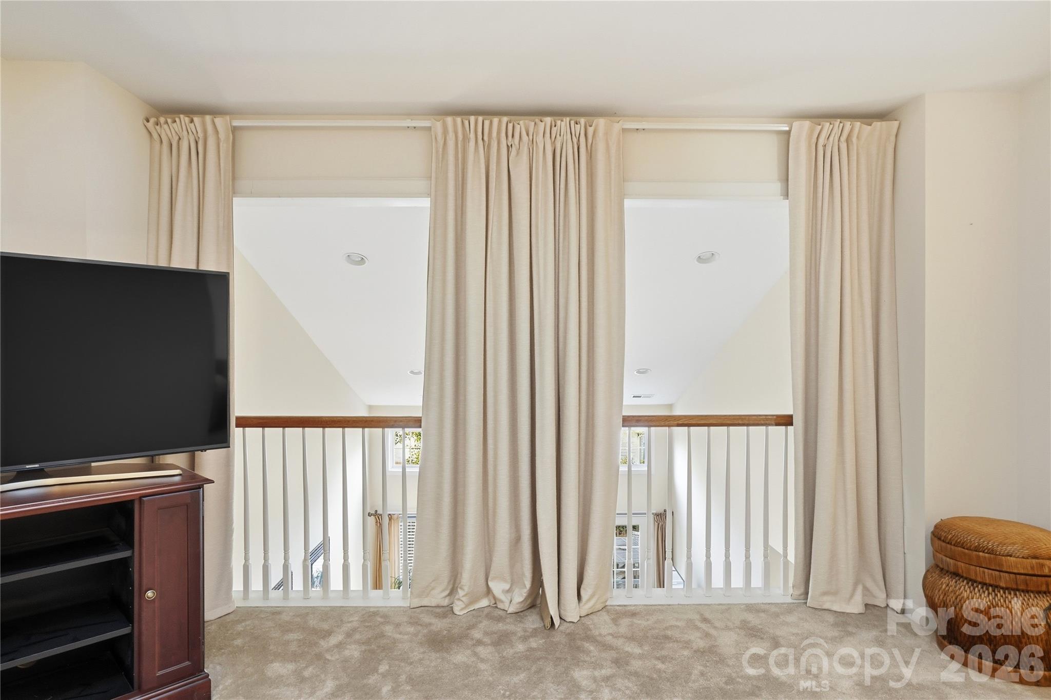 335 Garnet Court Fort Mill, SC 29708 - Photo 32 of 44 a view of a livingroom with furniture and staircase