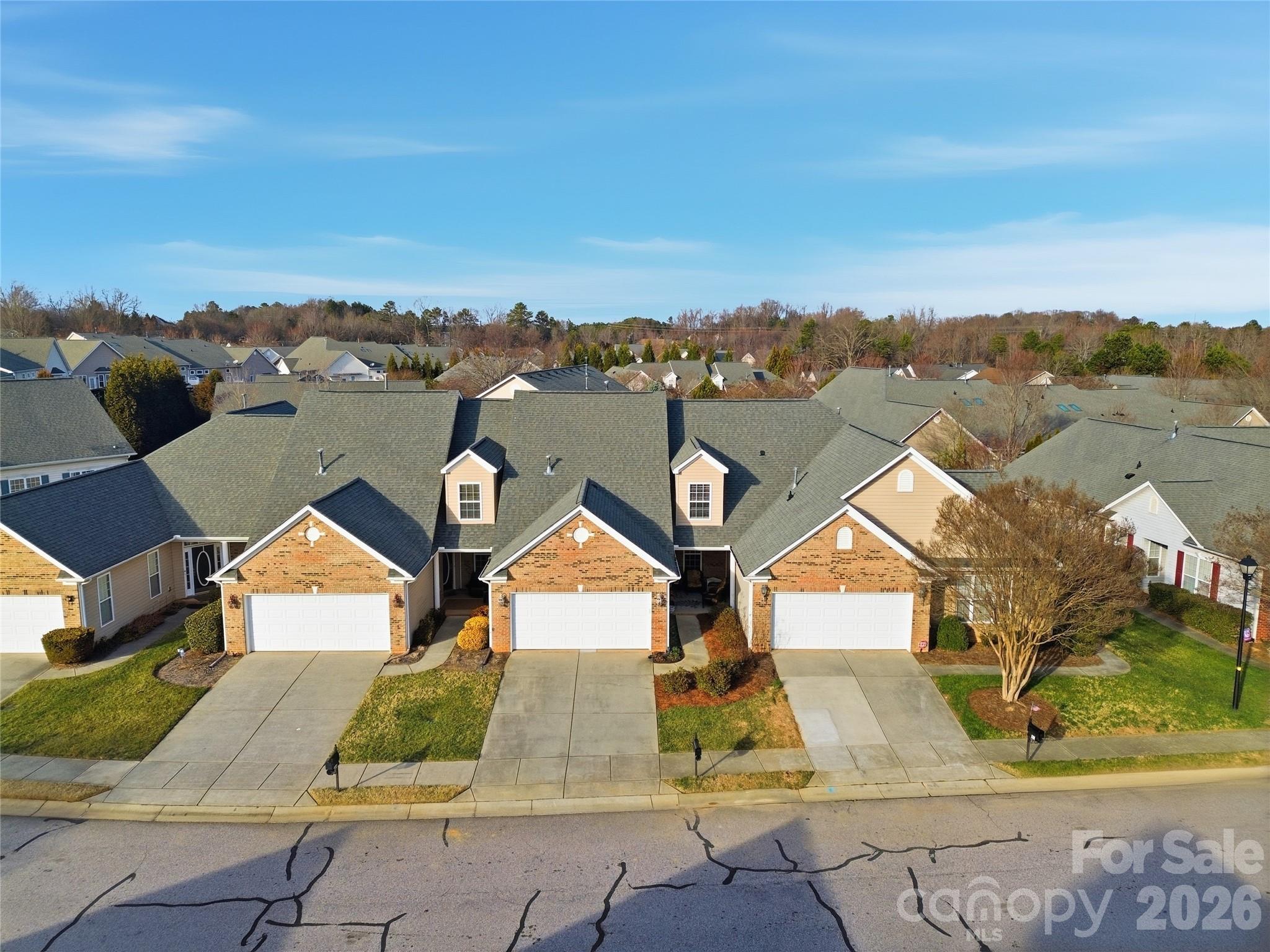 335 Garnet Court Fort Mill, SC 29708 - Photo 41 of 44 an aerial view of a house with a garden space