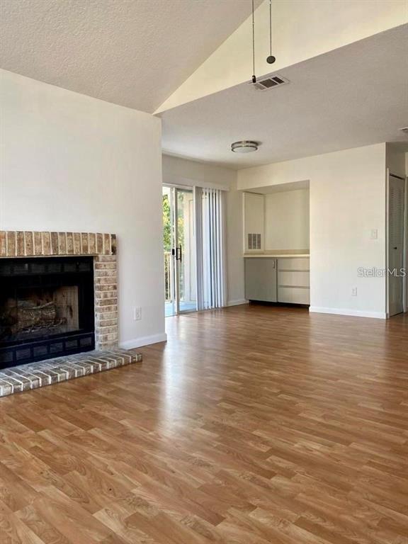 630 Steamboat Court, Unit 176 Altamonte Springs, FL 32714 - Photo 6 of 8 a view of a livingroom with a fireplace and window