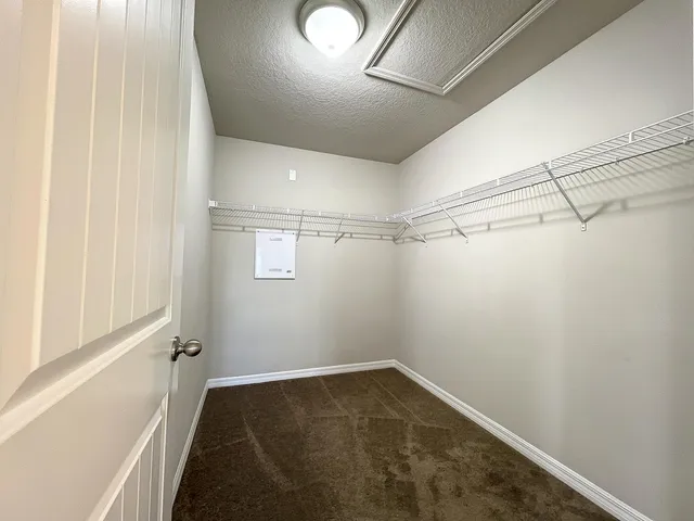 a view of a room with racks on the wall