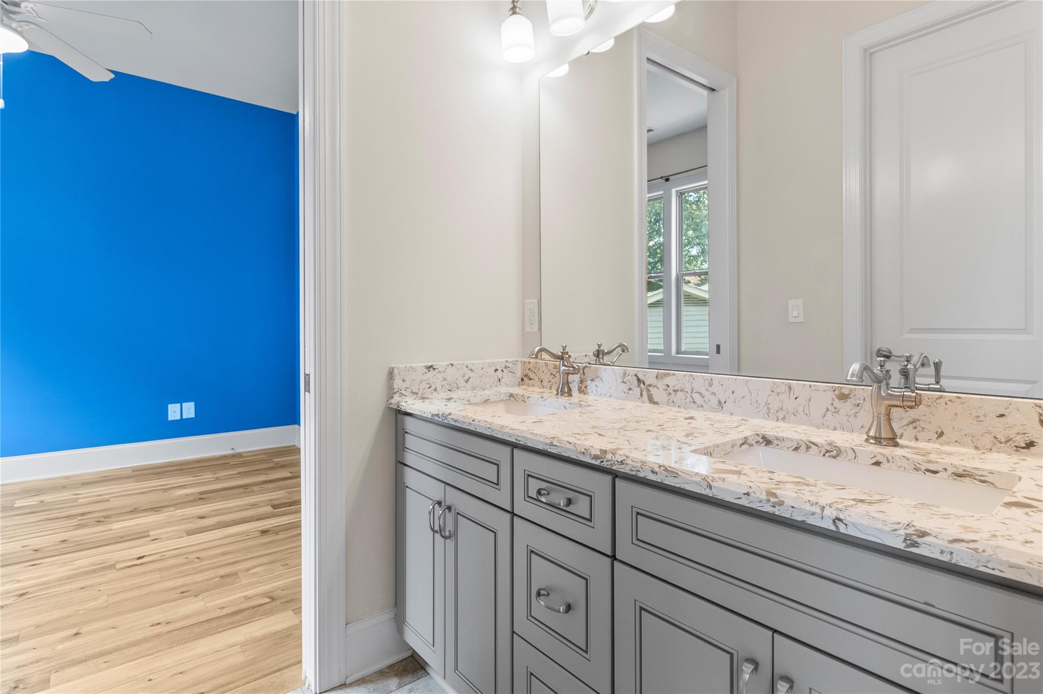 2500 Primm Road Denver, NC 28037 - Photo 19 of 46 a bathroom with a granite countertop sink and a mirror