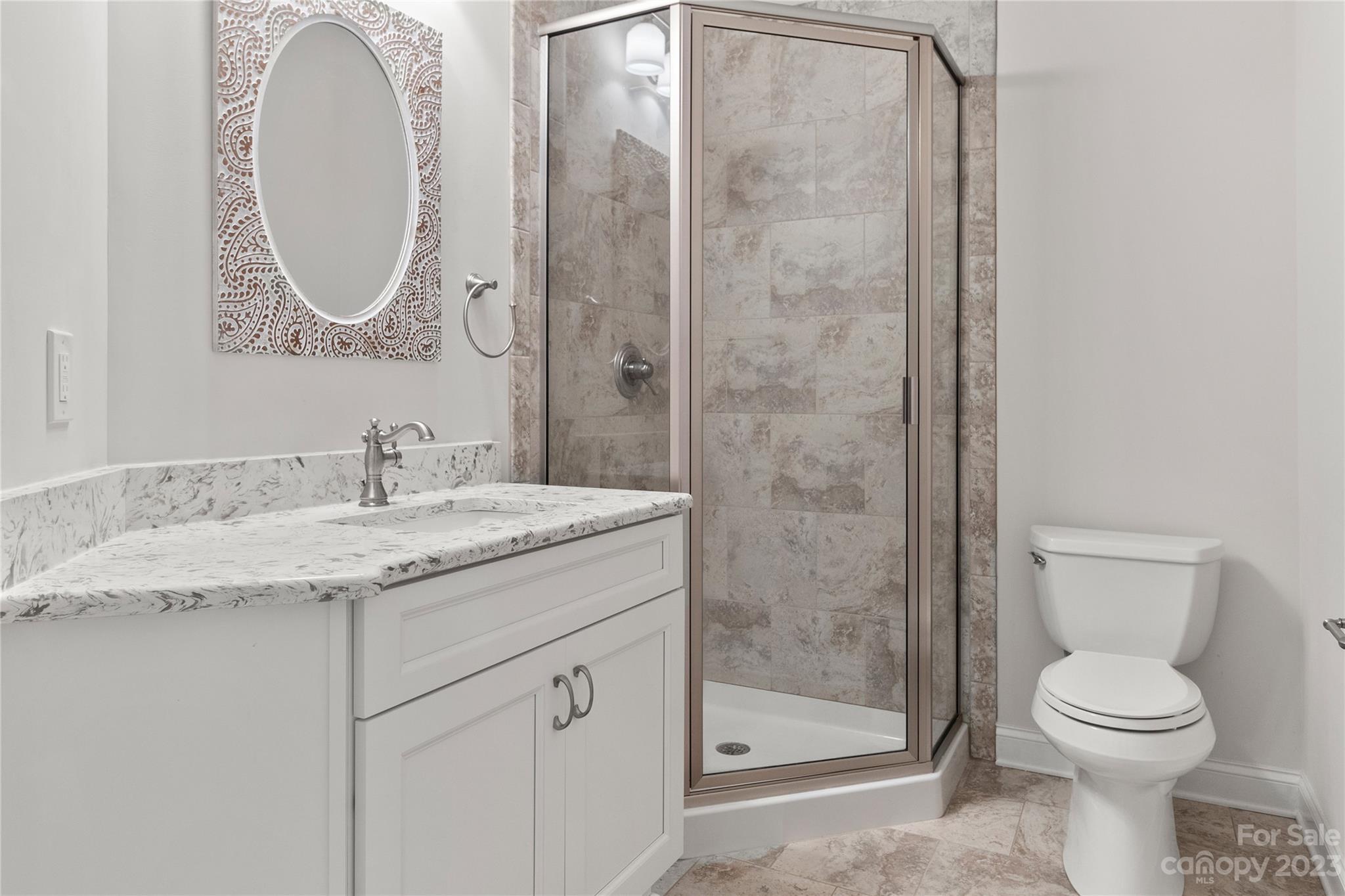 2500 Primm Road Denver, NC 28037 - Photo 24 of 46 a bathroom with a granite countertop sink toilet and shower