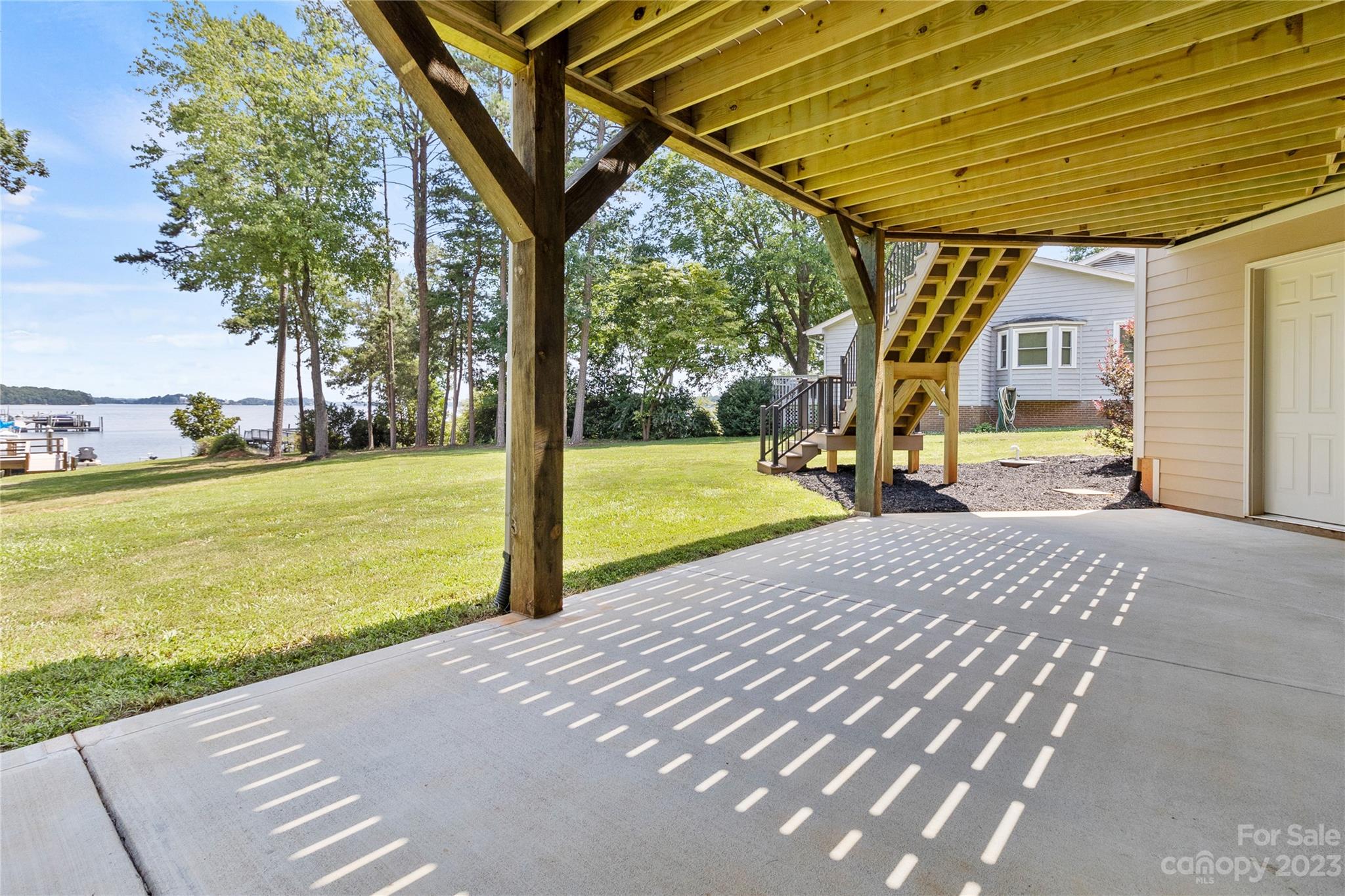 2500 Primm Road Denver, NC 28037 - Photo 37 of 46 a view of a house with backyard and a tree