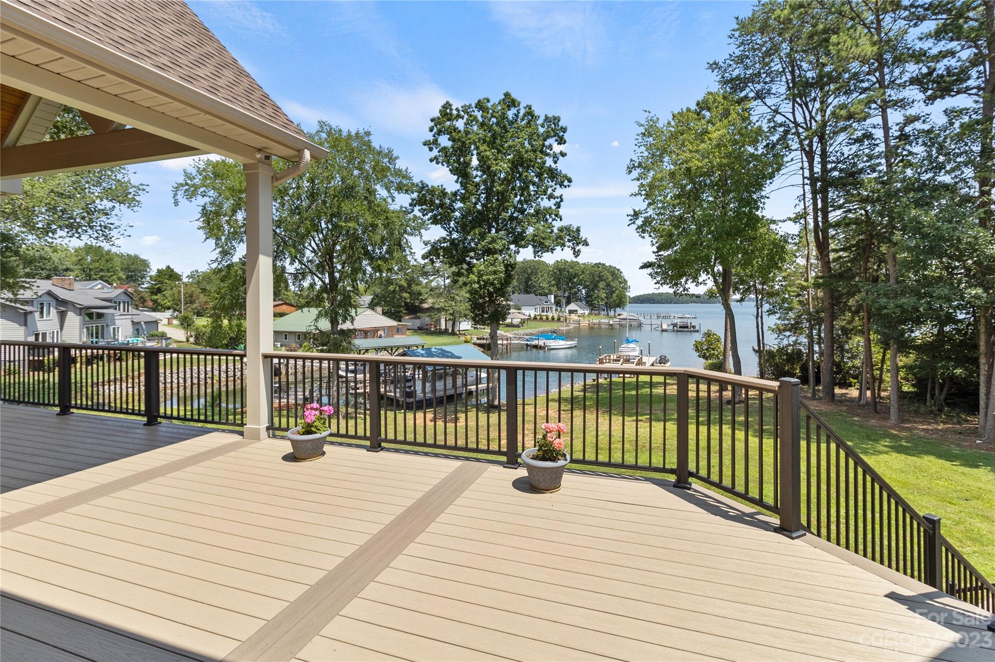 2500 Primm Road Denver, NC 28037 - Photo 38 of 46 a view of a balcony with wooden floor and wooden fence