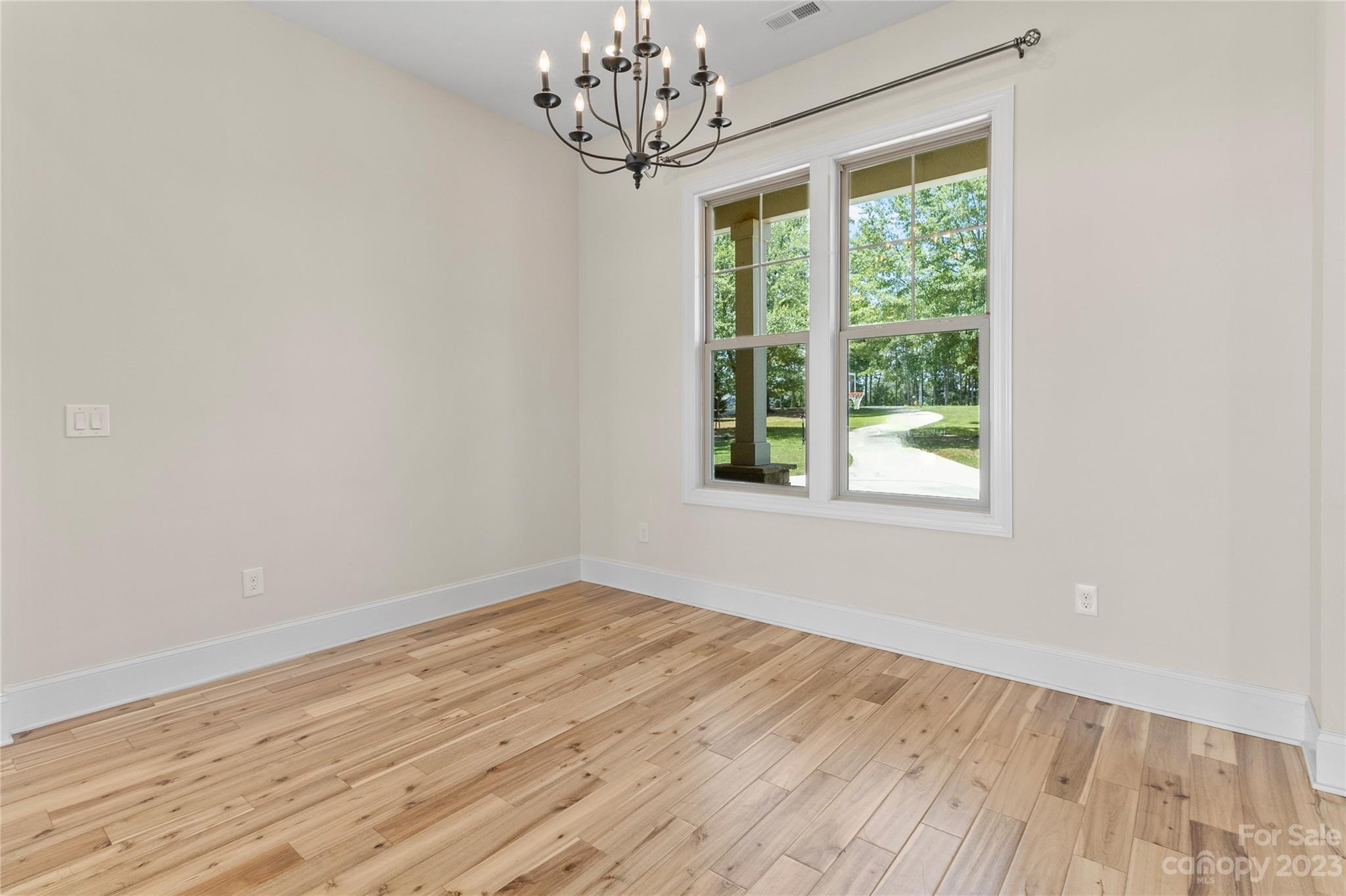 2500 Primm Road Denver, NC 28037 - Photo 6 of 46 wooden floor in an empty room with a window