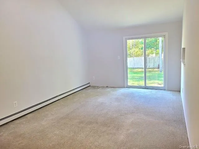 a view of a room with a window