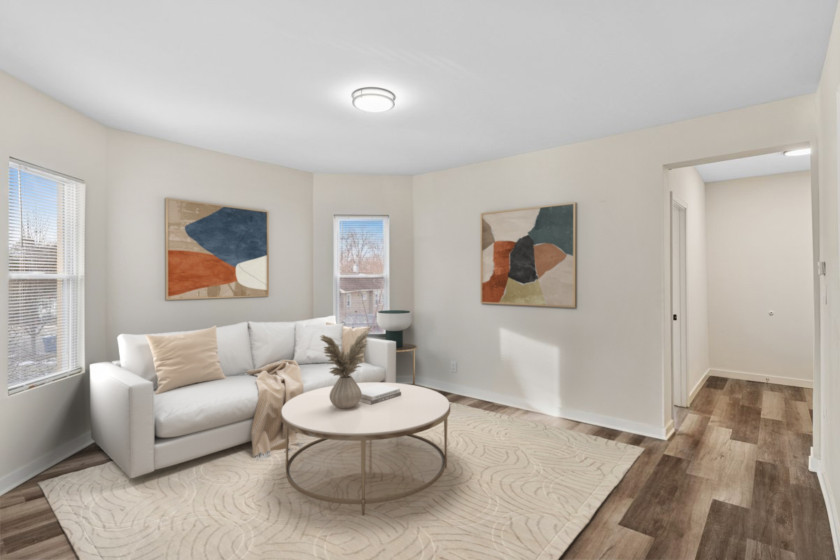 515 George Avenue, Unit 1 Waukegan, IL 60085 - Photo 9 of 15 a living room with furniture and a rug