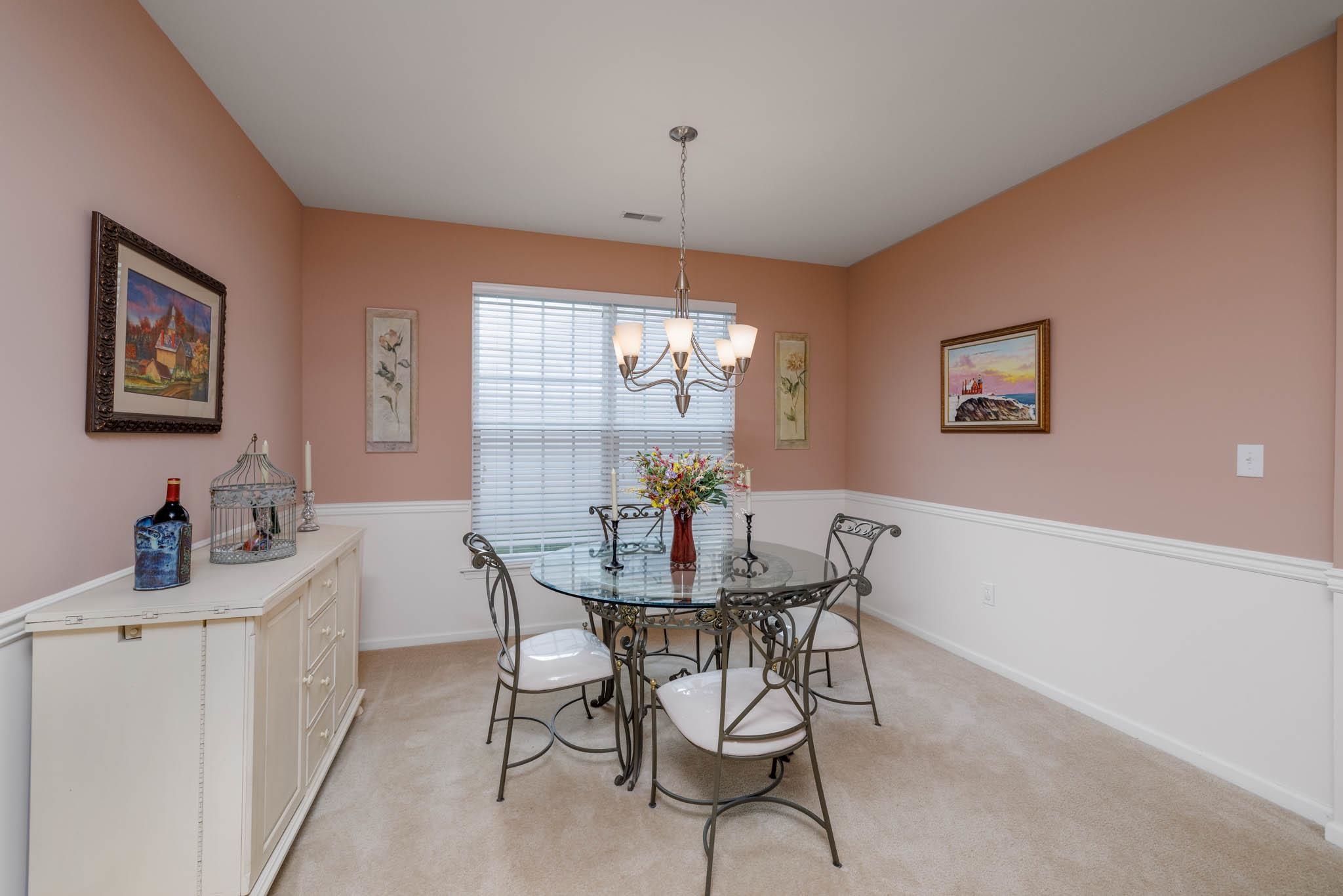 118 Aberdeen Way Rio Grande, NJ 08242 - Photo 12 of 35 a view of a dining room with furniture window and wooden floor