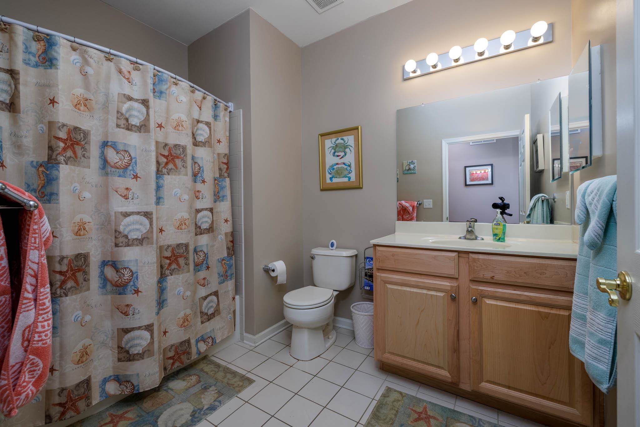 118 Aberdeen Way Rio Grande, NJ 08242 - Photo 23 of 35 a bathroom with a double vanity sink mirror and toilet