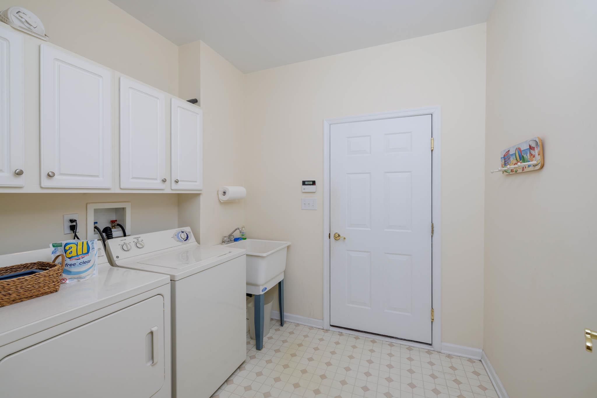 118 Aberdeen Way Rio Grande, NJ 08242 - Photo 24 of 35 a utility room with dryer and washer