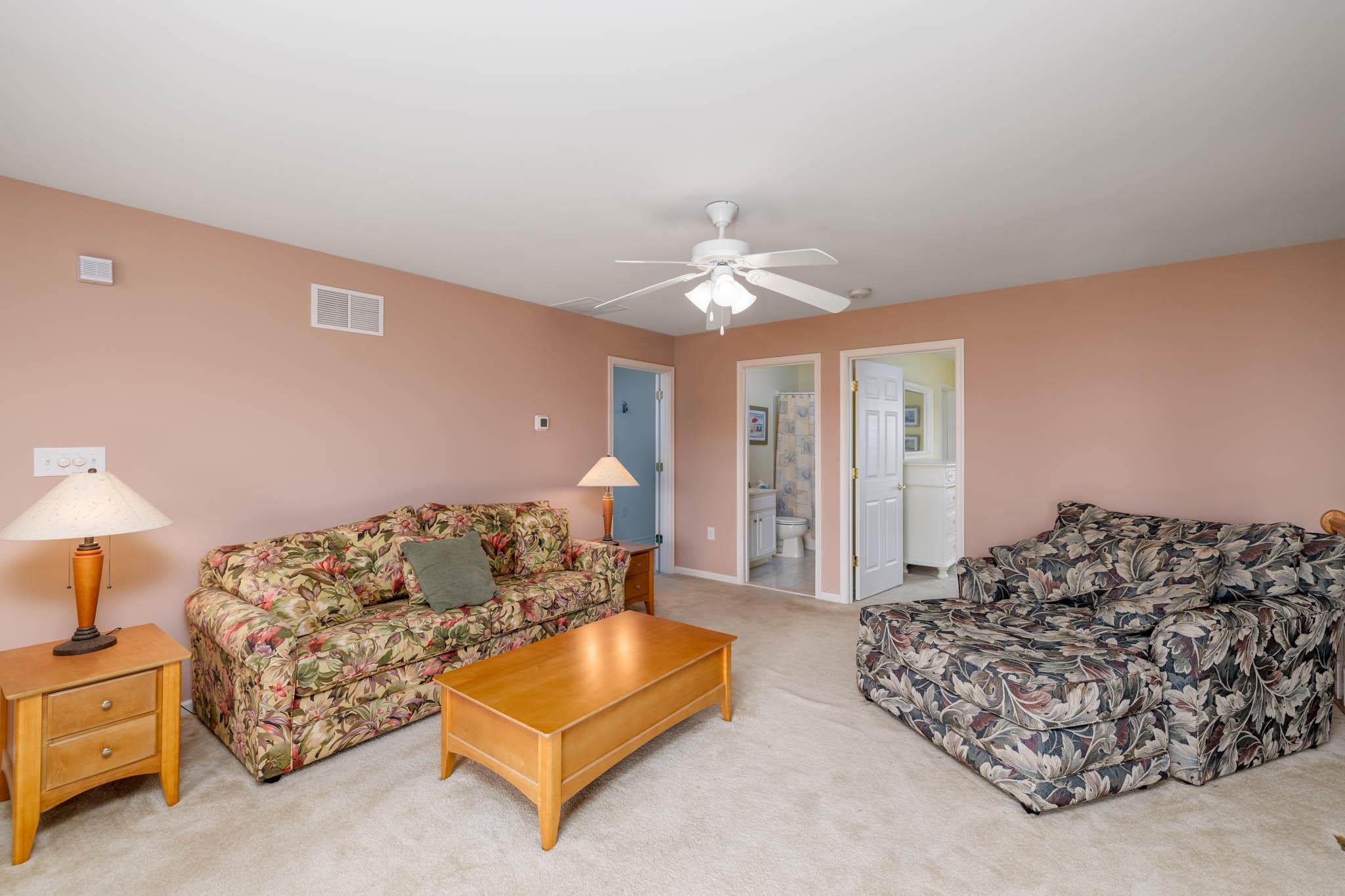 118 Aberdeen Way Rio Grande, NJ 08242 - Photo 26 of 35 a bedroom with bed and a couch
