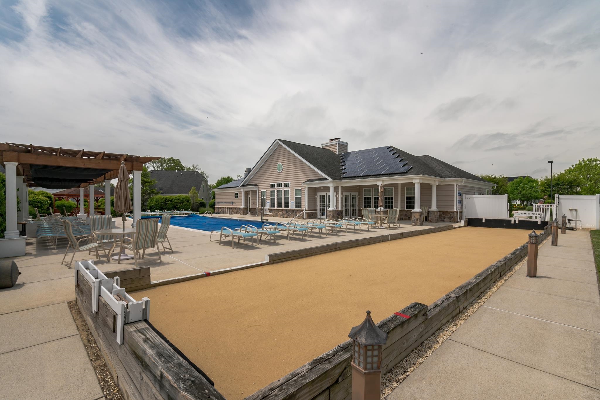 118 Aberdeen Way Rio Grande, NJ 08242 - Photo 33 of 35 an outdoor space with swimming pool and furniture