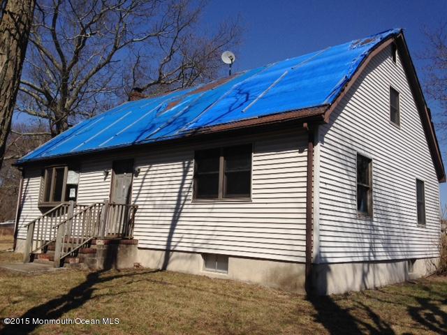 765 Fort Plains Road Howell, NJ 07731 - Photo 1 of 11 a view of a house with a yard