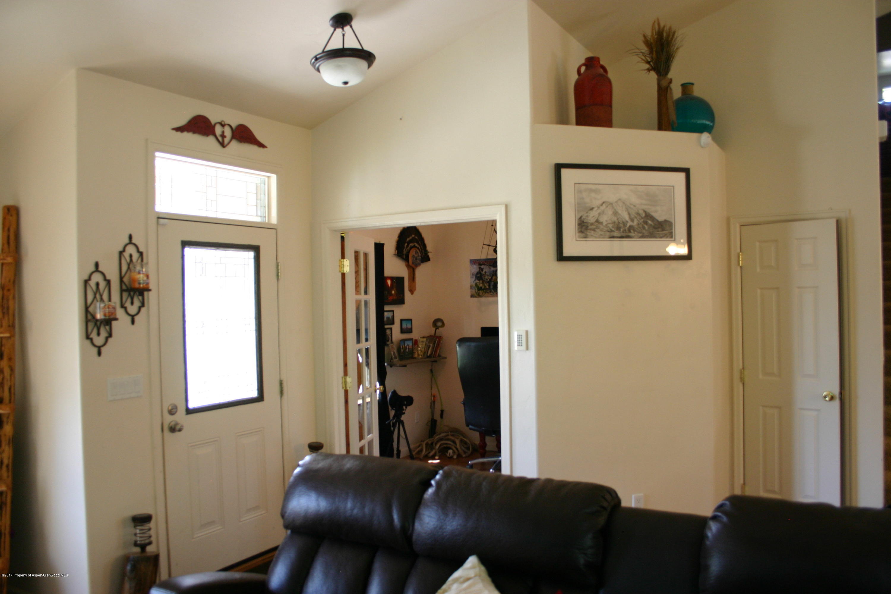 794 East 17th Street Rifle, CO 81650 - Photo 3 of 22 a room with furniture and a window
