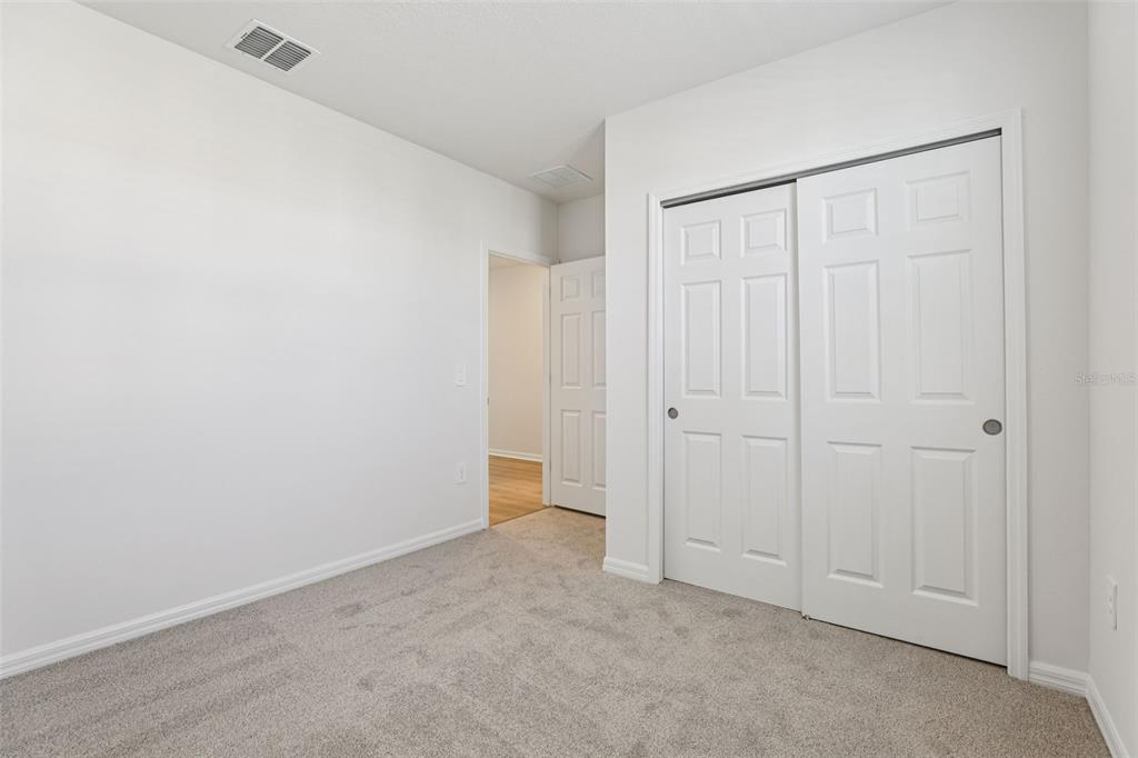 4018 Copperleaf Lane Kissimmee, FL 34759 - Photo 18 of 36 a view of an empty room
