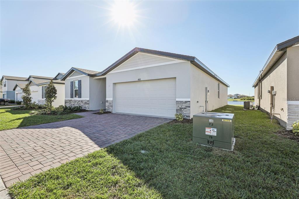 4018 Copperleaf Lane Kissimmee, FL 34759 - Photo 2 of 36 a view of a house with a yard and fence