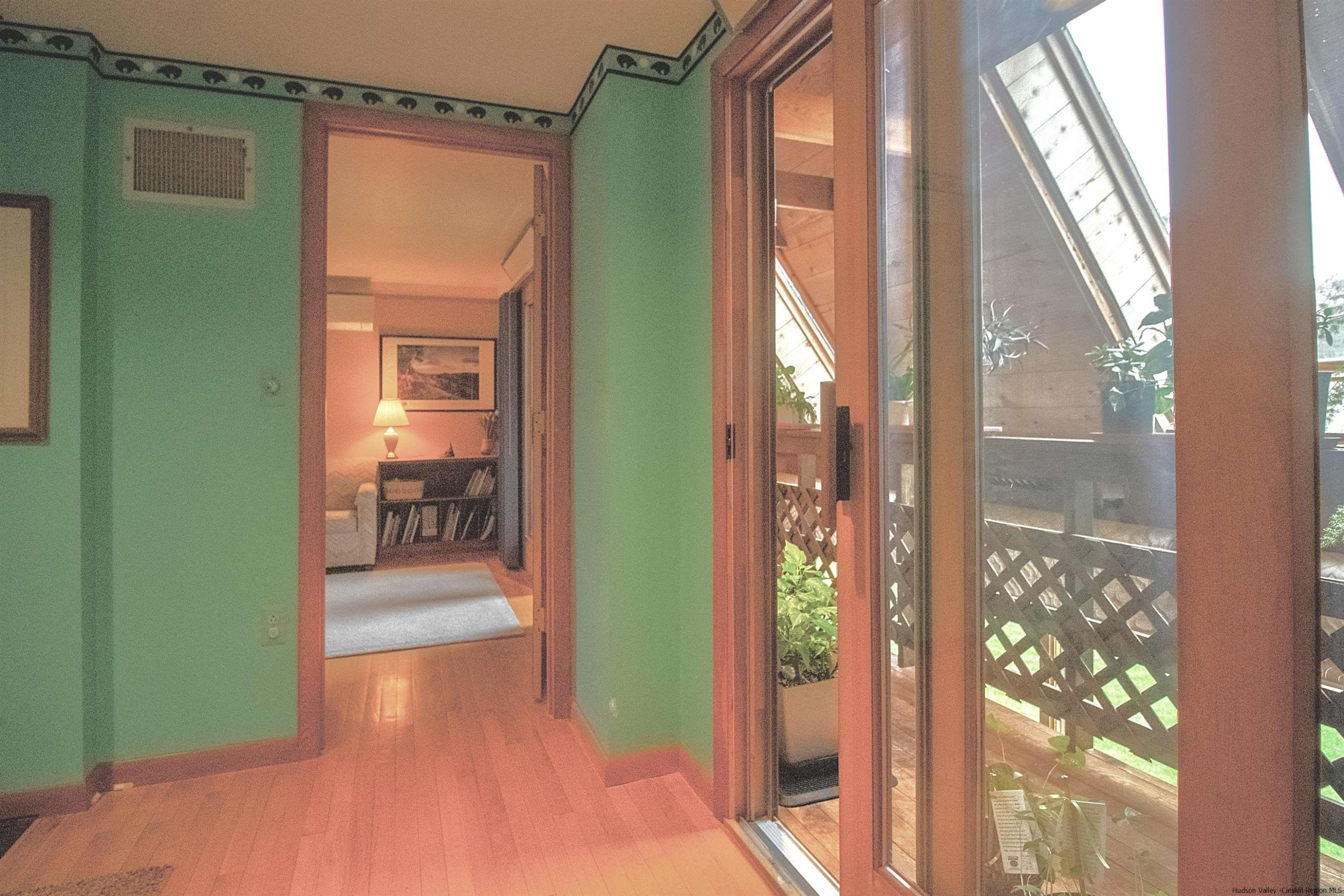 32 Mill Dam Road Stone Ridge, NY 12484 - Photo 13 of 33 a balcony with table and chairs