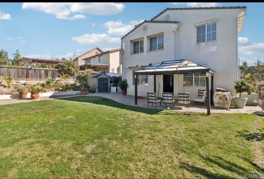 1234 Old Janal Ranch Road Chula Vista, CA 91915 - Photo 9 of 34 a view of a house with swimming pool and sitting area