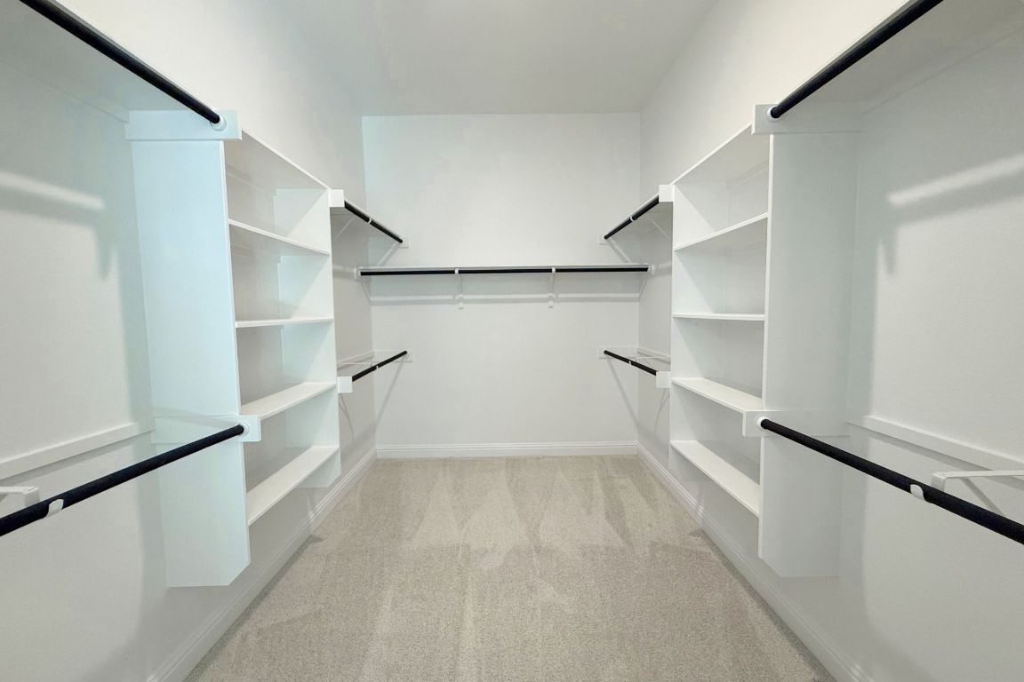 20301 Dustin Lane Pflugerville, TX 78660 - Photo 12 of 30 Spacious closet with light carpet