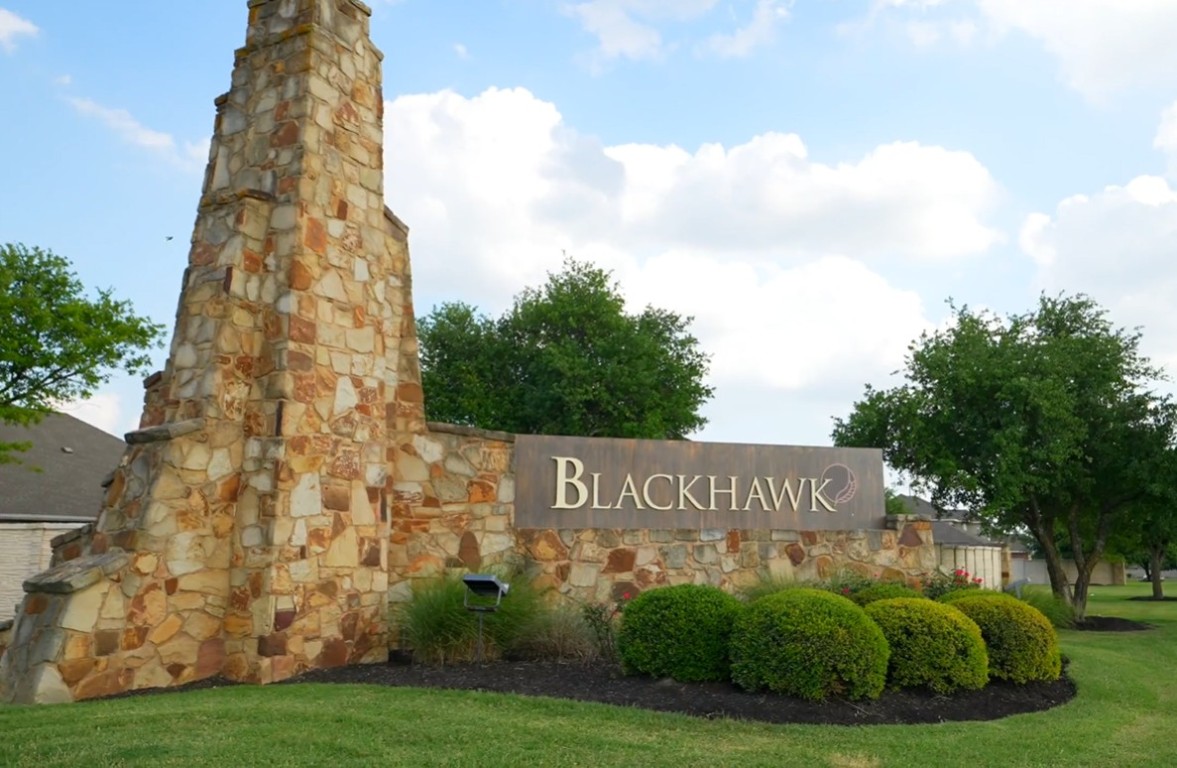 20301 Dustin Lane Pflugerville, TX 78660 - Photo 26 of 30 Community / neighborhood sign with a yard
