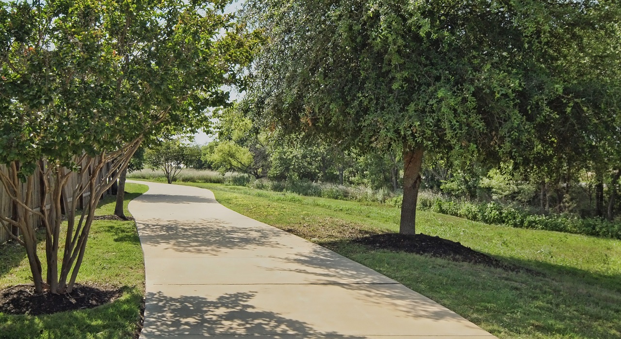 20301 Dustin Lane Pflugerville, TX 78660 - Photo 28 of 30 Surrounding community with a lawn