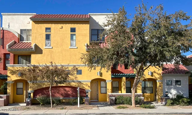 a front view of a building with street view