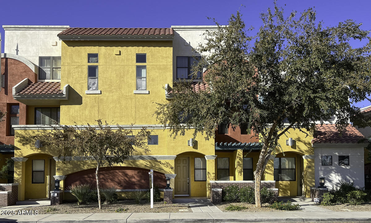 a front view of a building with street view