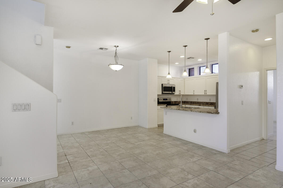 123 North Washington Street, Unit 22 Chandler, AZ 85225 - Photo 9 of 33 a view of a kitchen with electric appliances