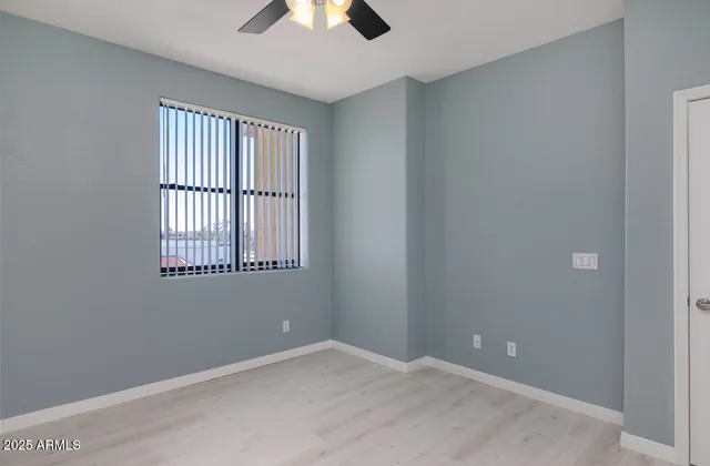 a kitchen with granite countertop a refrigerator and a stove