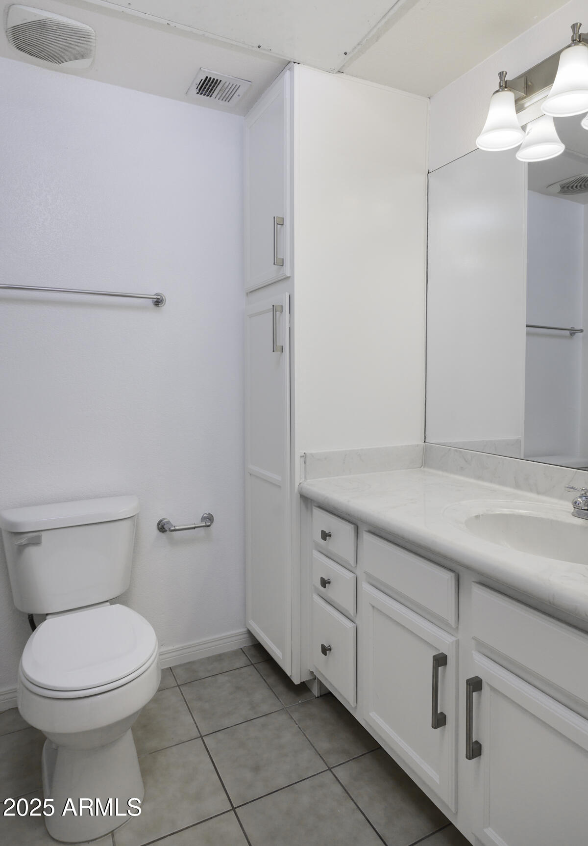 123 North Washington Street, Unit 22 Chandler, AZ 85225 - Photo 20 of 33 a bathroom with a toilet sink and vanity