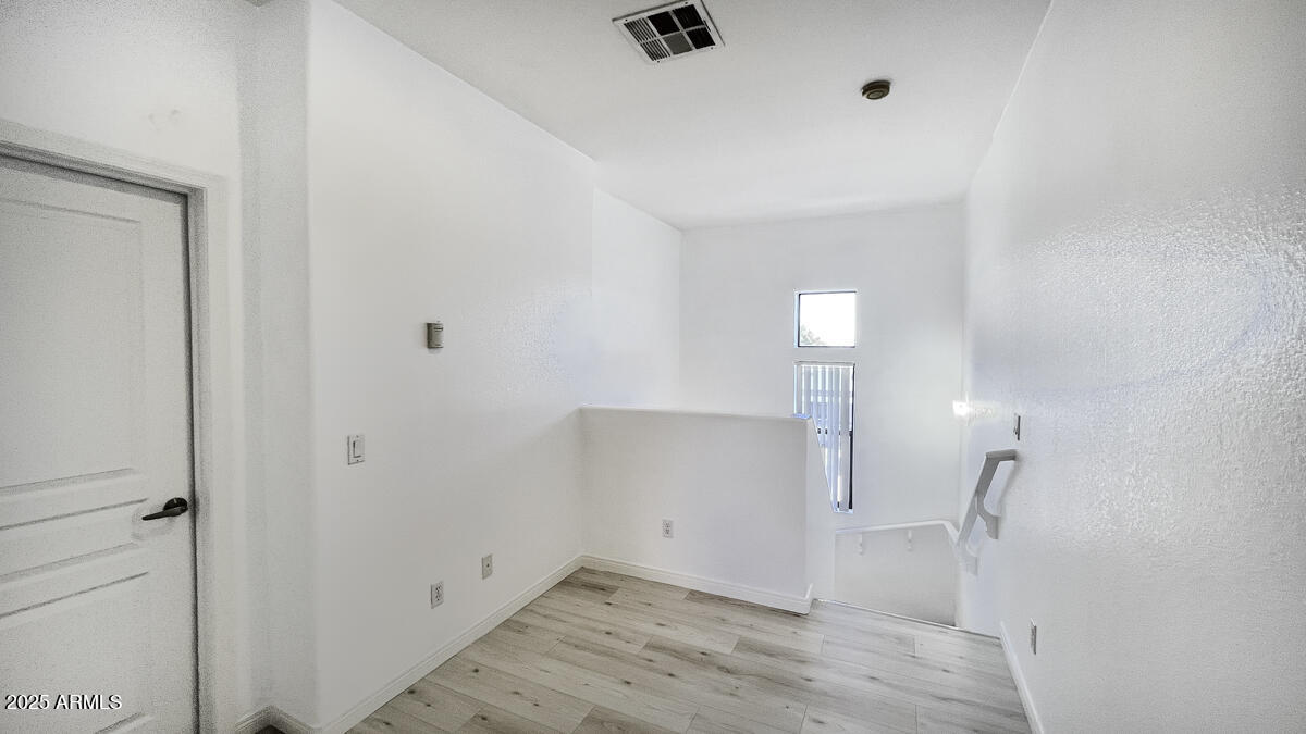 123 North Washington Street, Unit 22 Chandler, AZ 85225 - Photo 22 of 33 wooden floor in an empty room