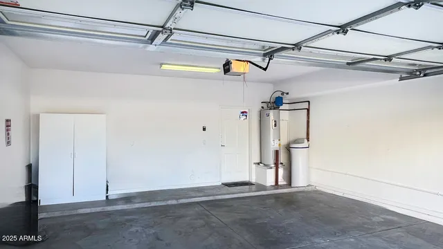 a bathroom with a toilet sink and vanity