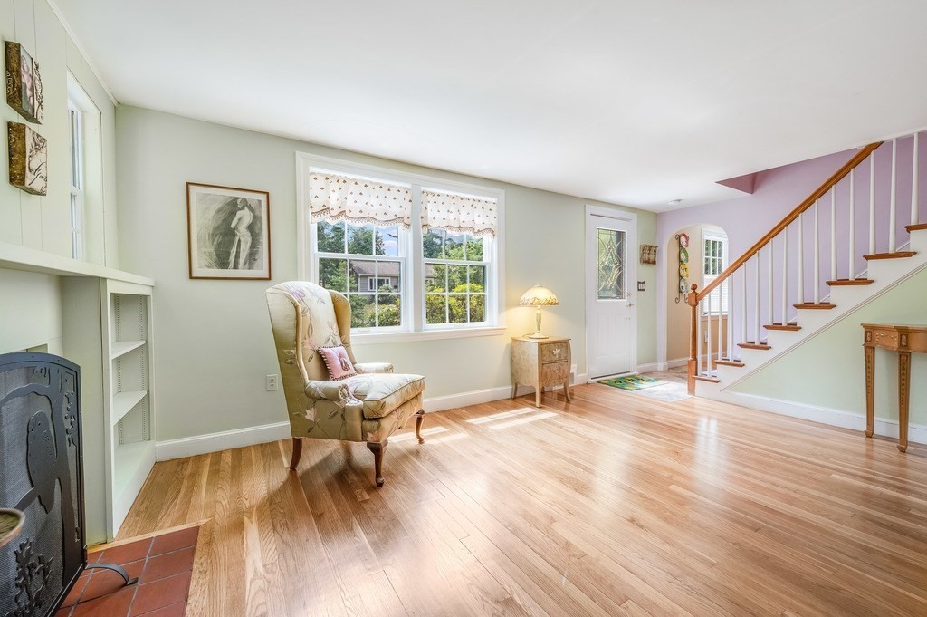 14 Mitchell Road Lynnfield, MA 01940 - Photo 18 of 36 a living room with furniture and a wooden floor