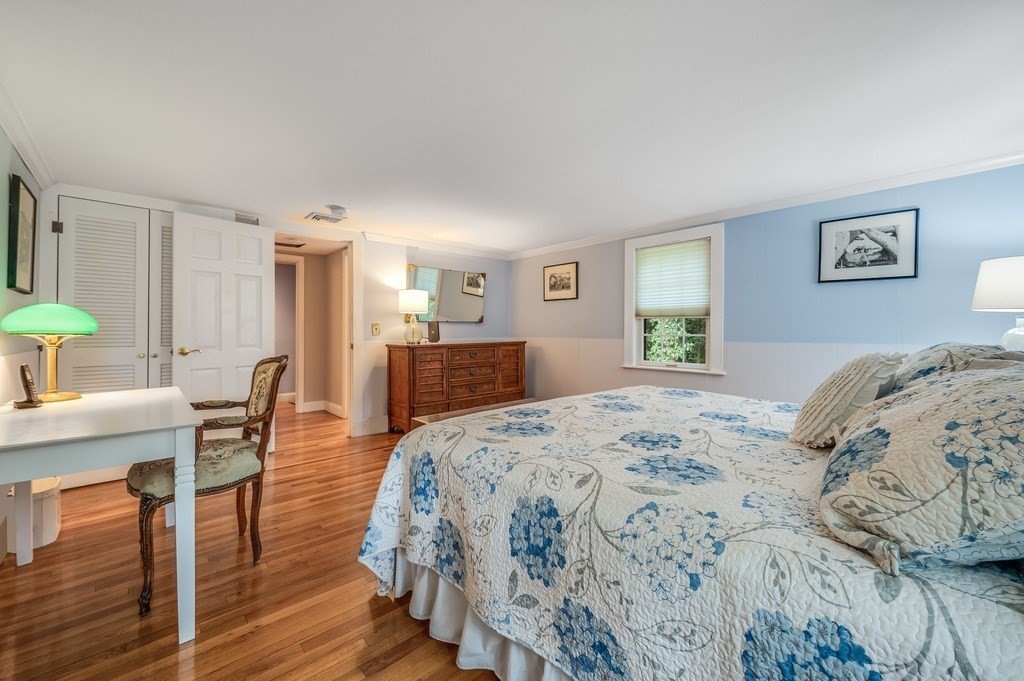 14 Mitchell Road Lynnfield, MA 01940 - Photo 24 of 36 a bedroom with bed and wooden floor