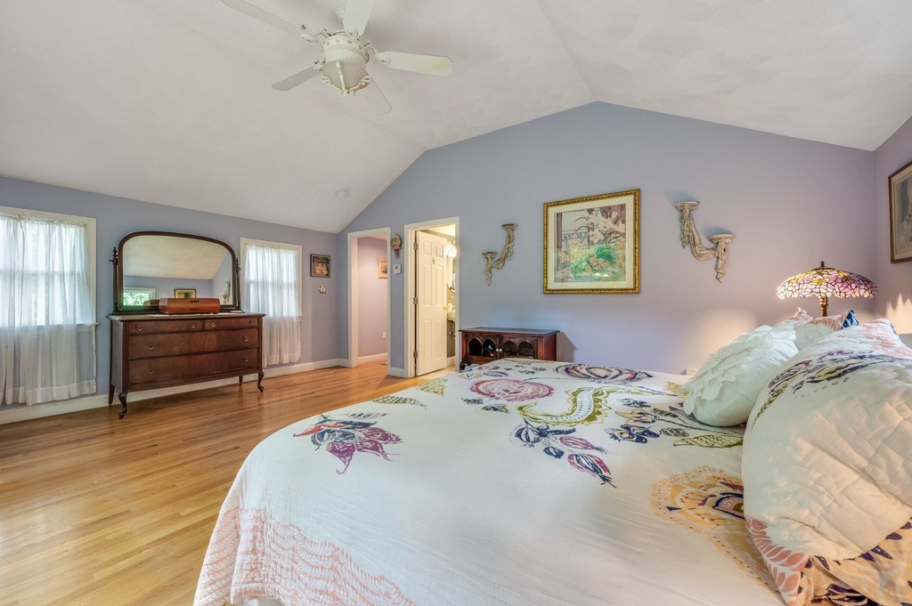 14 Mitchell Road Lynnfield, MA 01940 - Photo 27 of 36 a bedroom with bed and a wooden floor