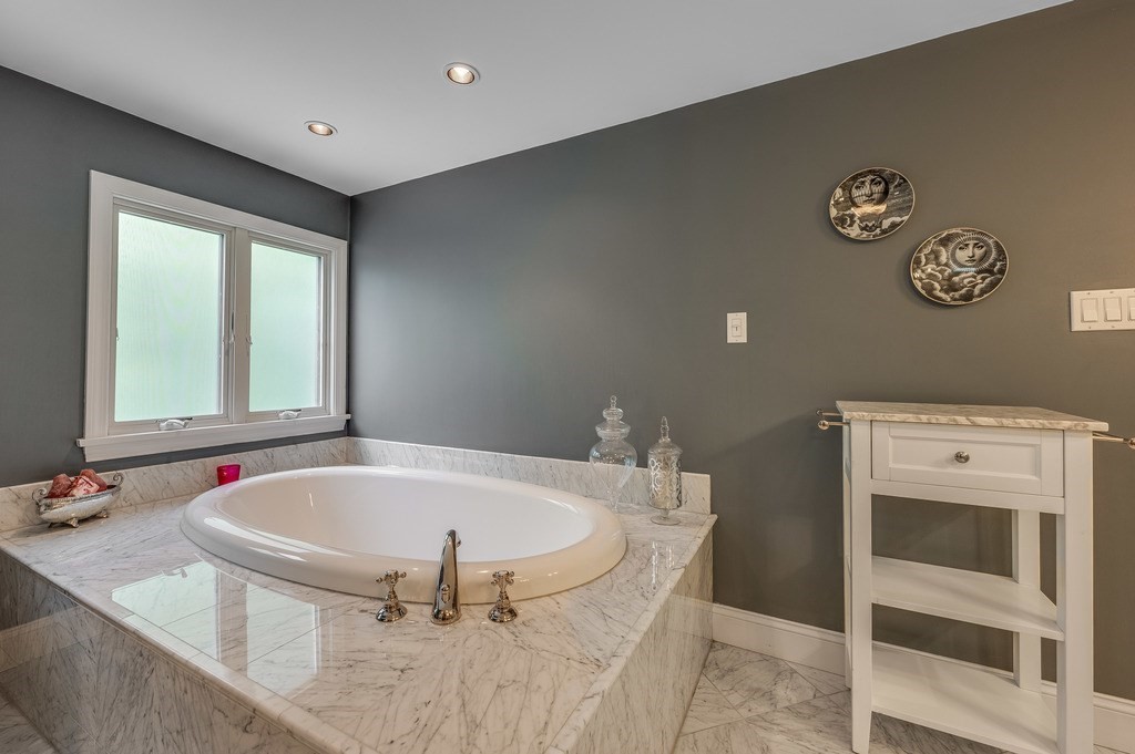 14 Mitchell Road Lynnfield, MA 01940 - Photo 28 of 36 a bathroom with a tub and a sink