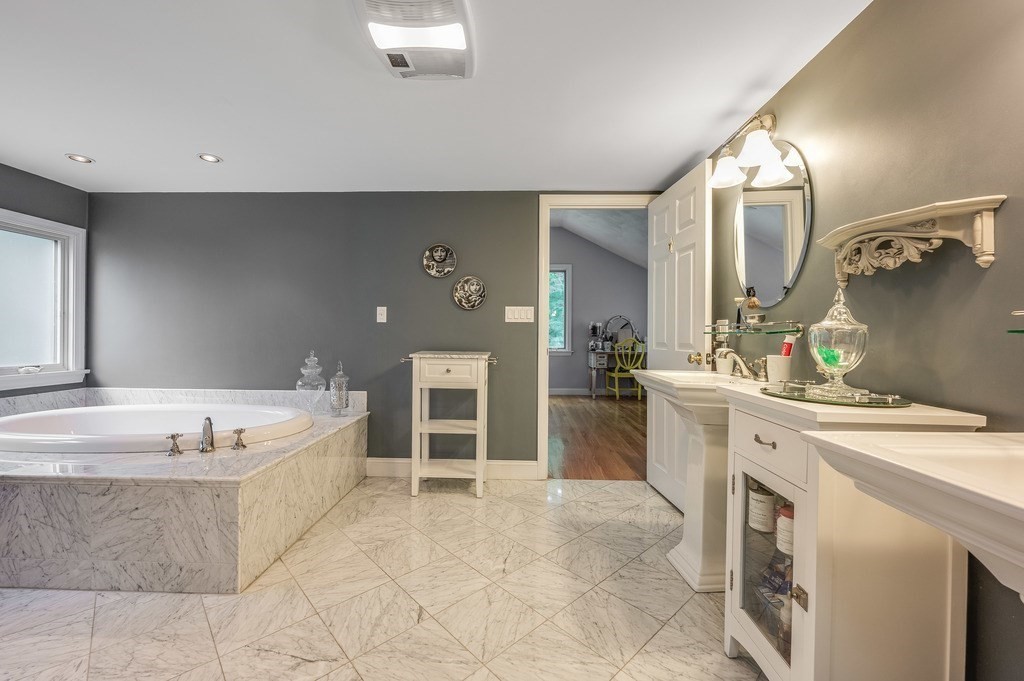 14 Mitchell Road Lynnfield, MA 01940 - Photo 29 of 36 a spacious bathroom with a tub sink and mirror