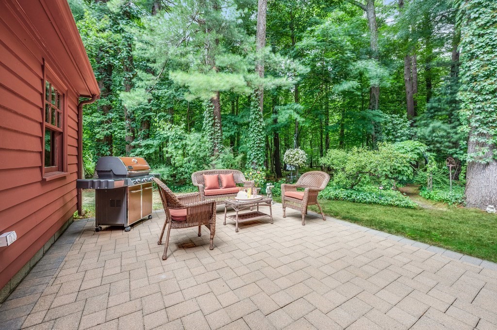 14 Mitchell Road Lynnfield, MA 01940 - Photo 33 of 36 a chairs and a table in the garden