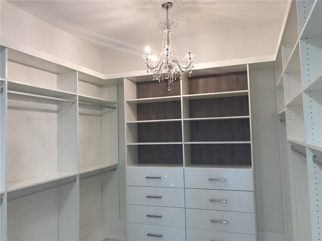 5208 Beland Drive Lake Worth, FL 33467 - Photo 12 of 21 a view of a room with empty racks